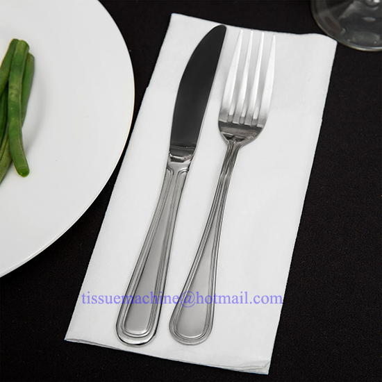 Nonwoven napkin with pocket